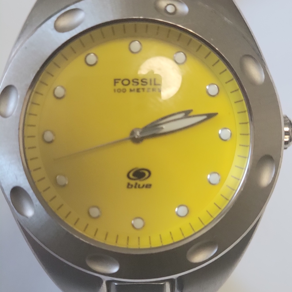 Fossil Smartwatch with Yellow Dial and Silver Accents